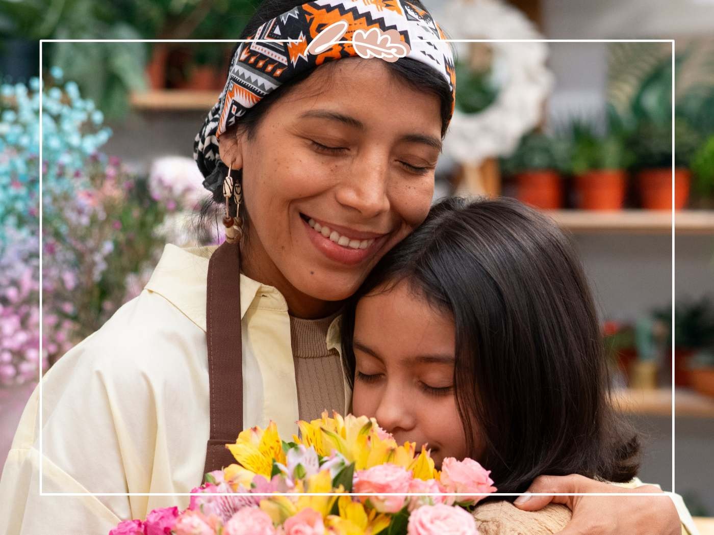 Tender hug between mum and daughter, faces close over a bright birthday bouquet — Fabulous Birthday Wishes for Mom.