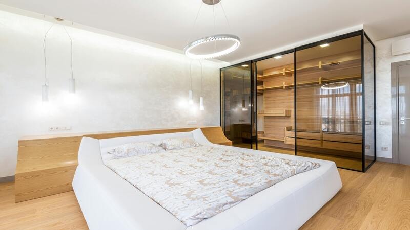 Modern bedroom with stylish pendant and ceiling lights using E27 LED bulbs