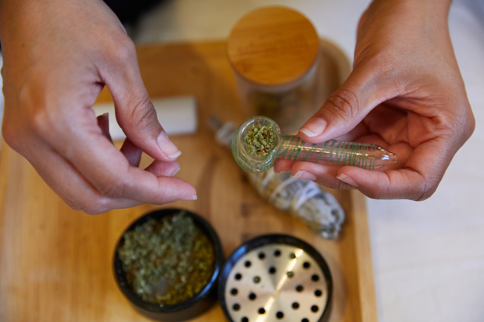 Packing Herb into a Bowl