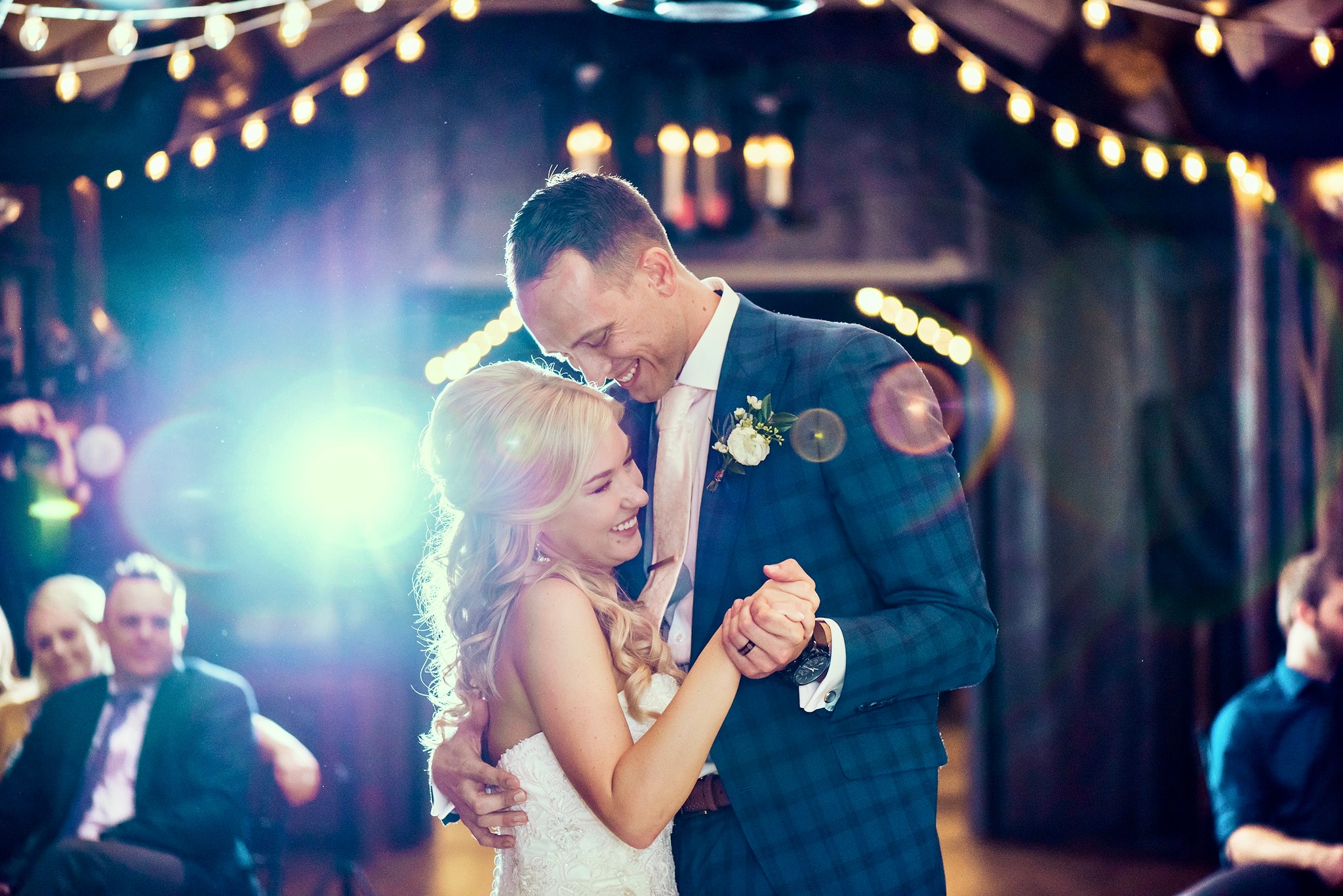 A wedding day experience capturing joyful moments between the bride, groom, and guests.