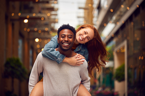 Happy couple. Confident happy woman has a better relationship - a teaching from Jay Shetty's 8 Rules of Love.