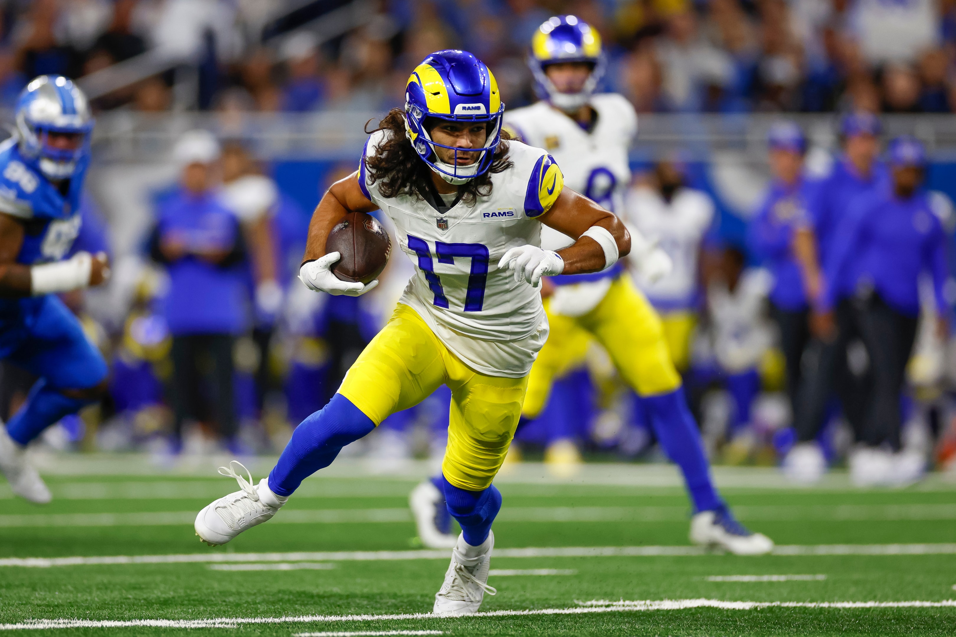 Puka Nacua of the Los Angeles Rams runs after a catch in the first half during an NFL football game at Ford Field on September 8, 2024 in Detroit, Michigan.