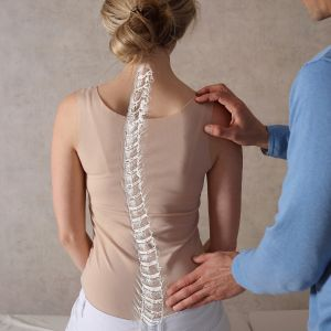 Woman getting check by chiropractor