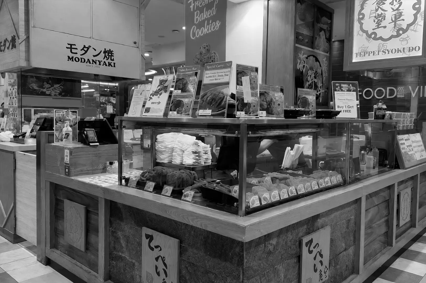 Teppei Syokudo outlet at Takashimaya showcasing its Japanese food counter and menu displays.