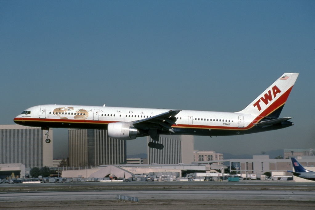 TWA aircraft landing at an airport.