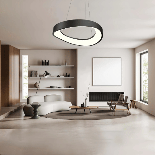 Contemporary Scandinavian ring-shaped ceiling pendant light in black and white illuminating a minimalist living room.