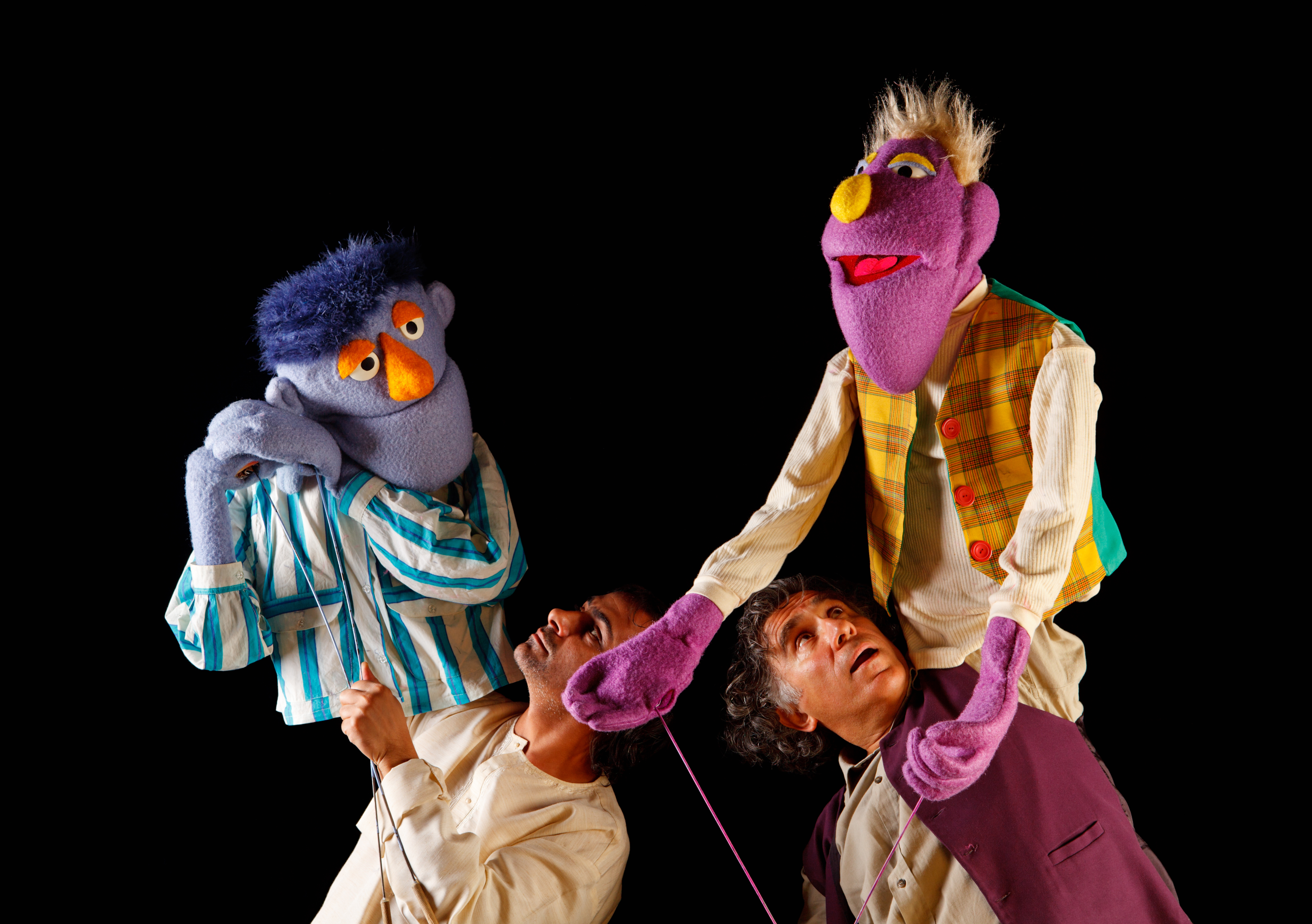 Puppeteers with their puppets on show