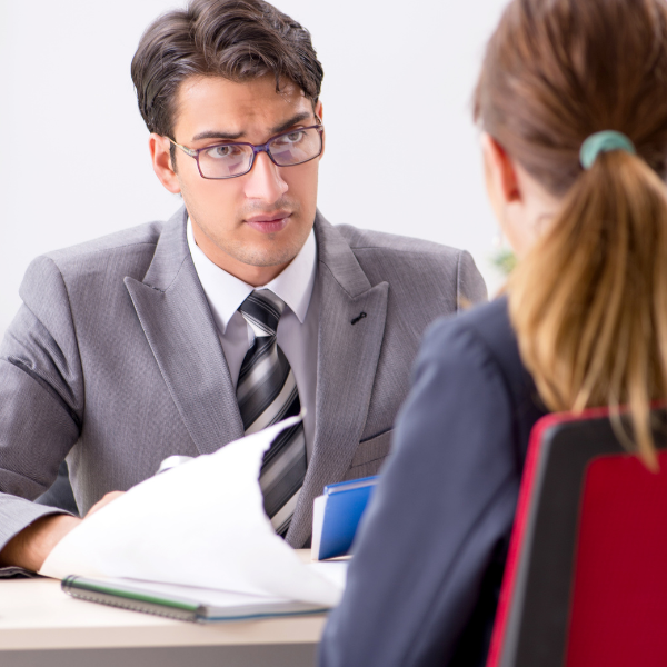 An image showing a person consulting with a car accident lawyer.