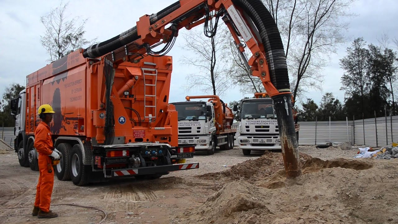 larger excavators digging trenches