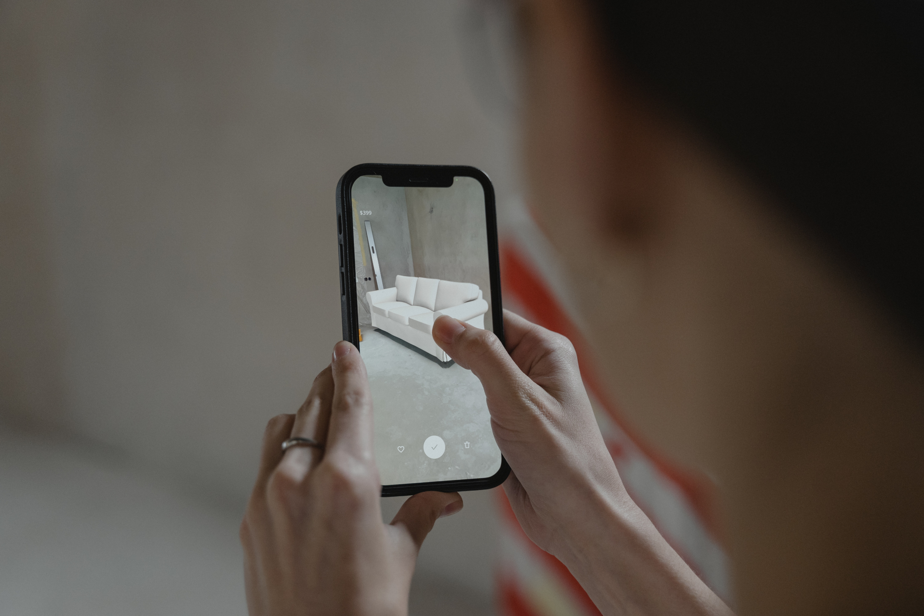 Person holding up phone using an augmented reality app