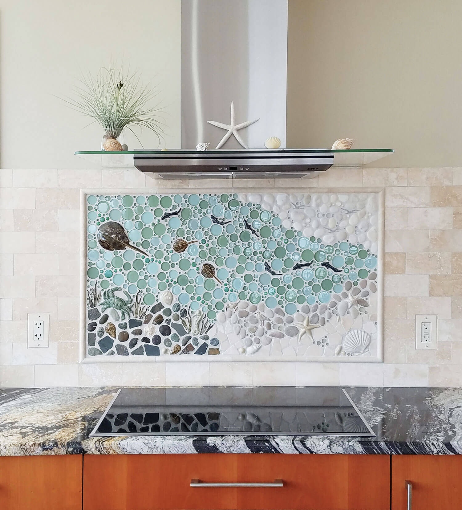 dogfish and horseshoe crabs proclaim a love of nature against a clean, subtle subway tile in marble pattern