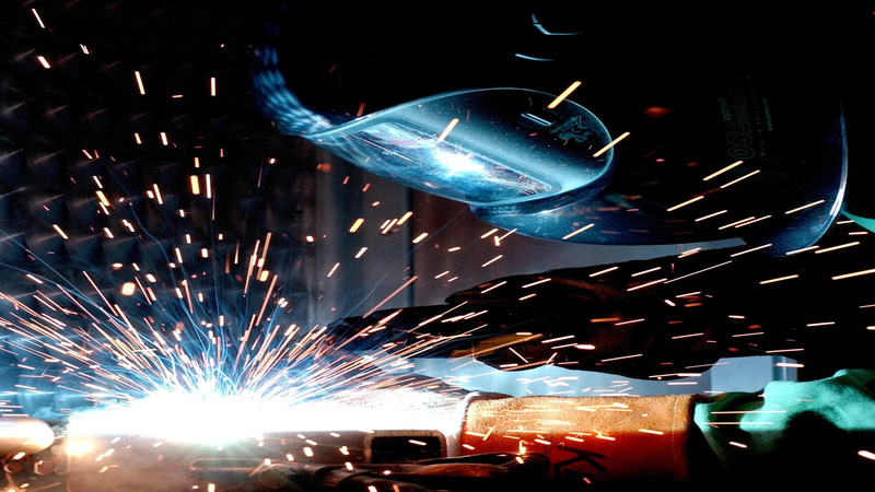 A welding expert using backstep welding to join metal pieces. 