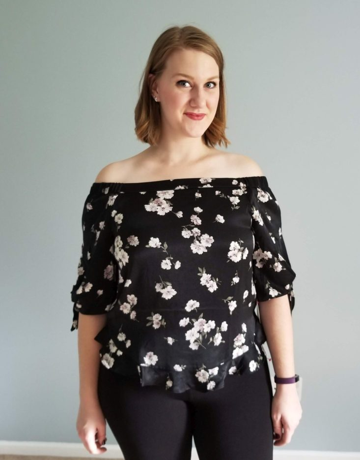 Haley Faye wearing a Bella Ruffle top from her Dailylook clothing box.