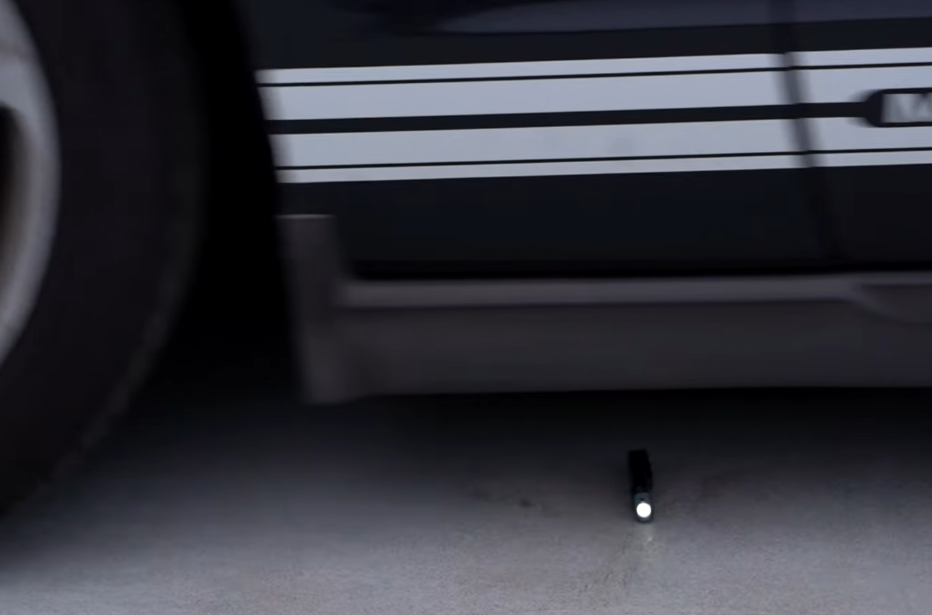 OLIGHT Arkfled flashlight ran over by car