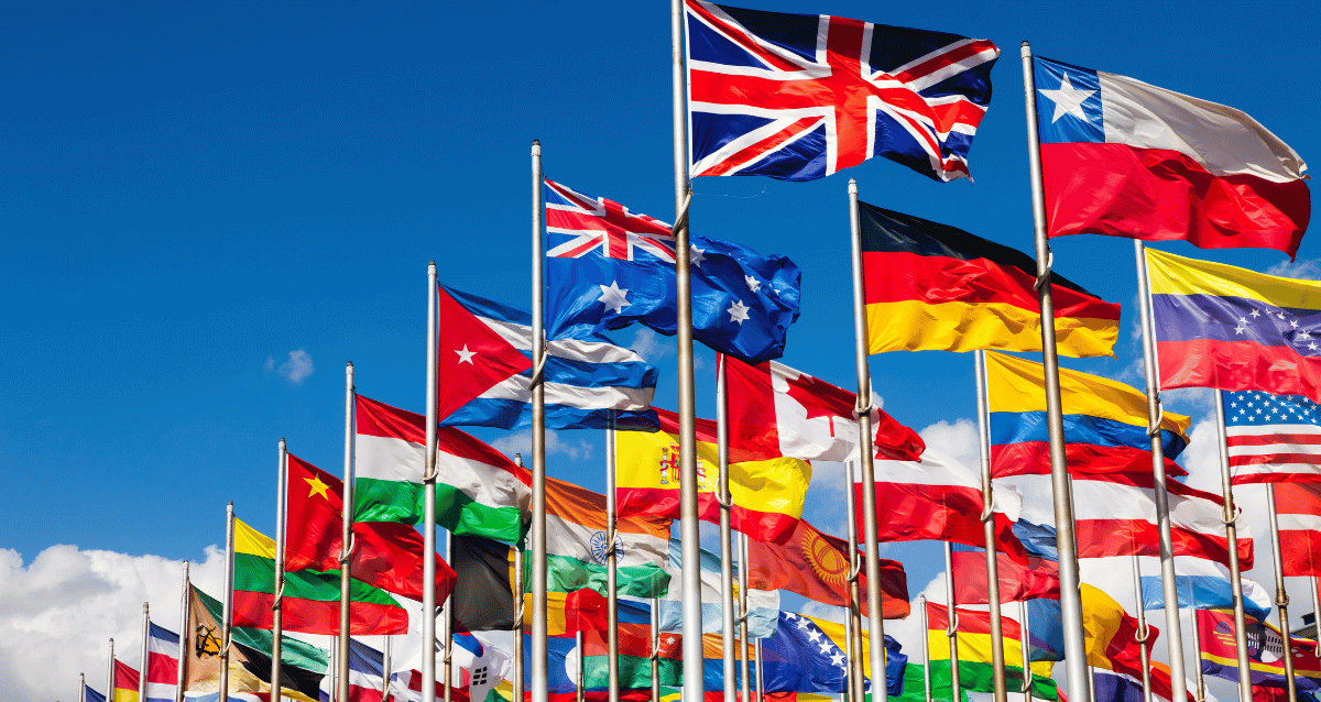 Image of flags from all over the world representing choose the country to ship your car from