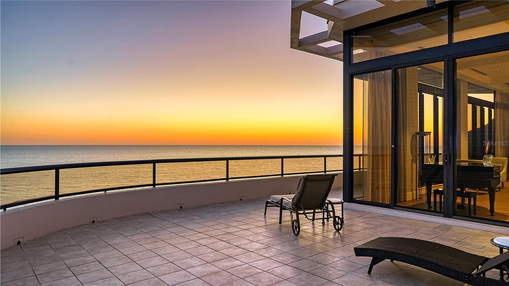 L'Ambiance balcony view of a sunset over the Gulf of Mexico