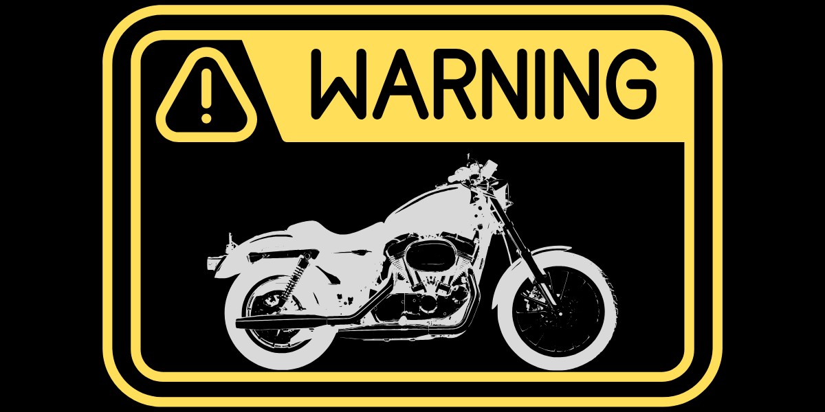 motorcycle silhouette inside of a warning sign