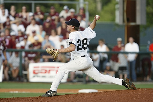 A pitcher in his pitching stride.