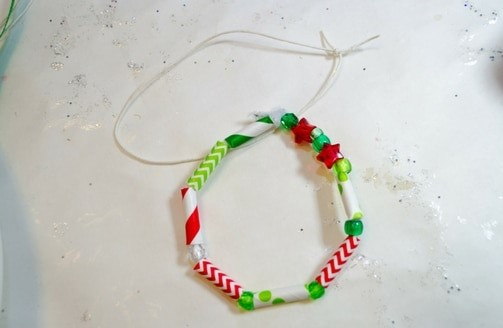 Pipe cleaner with beads and paper straws