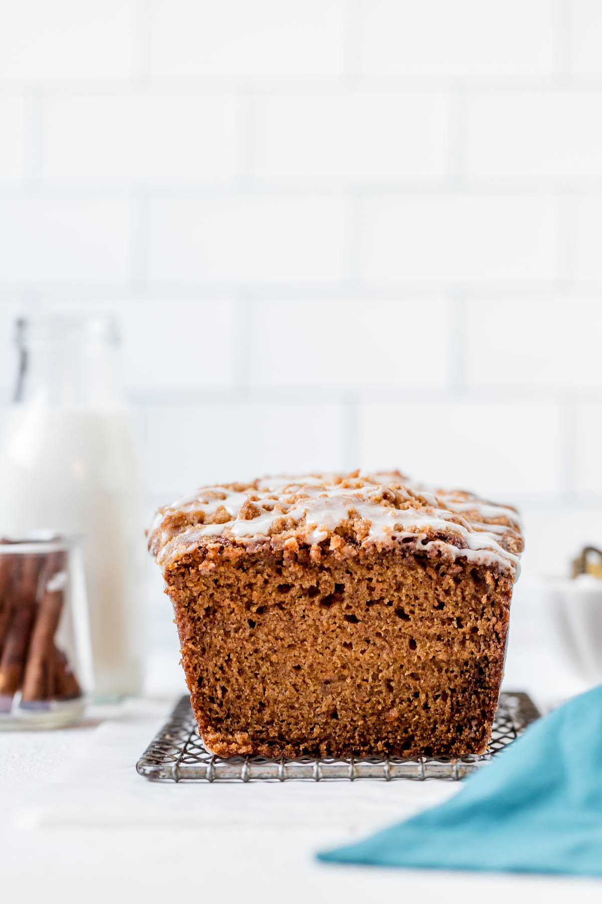 sweet potato quick bread cut in half on a wire rack