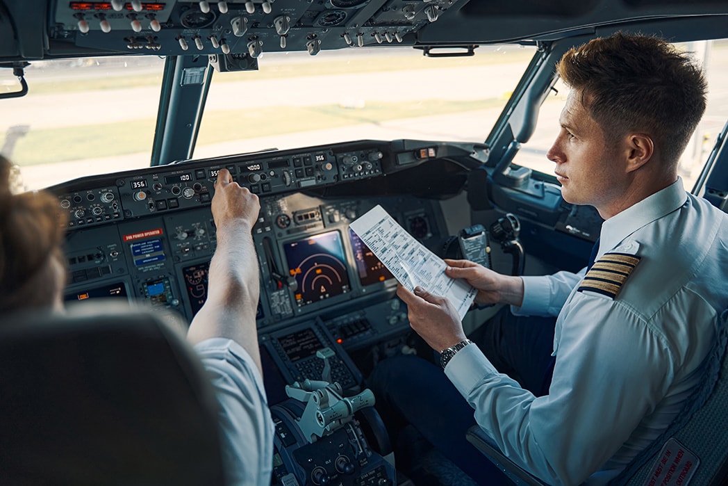 A flight instructor providing training to a student pilot.