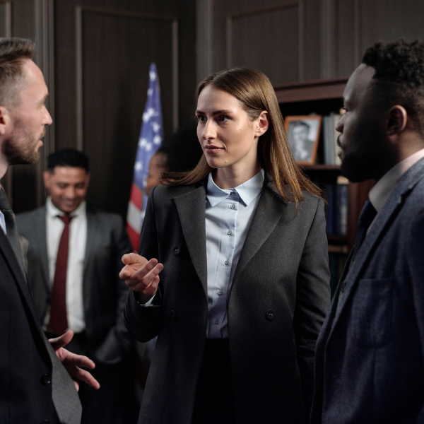 An image showing a team of experienced lawyers discussing a car accident case in Alabama.