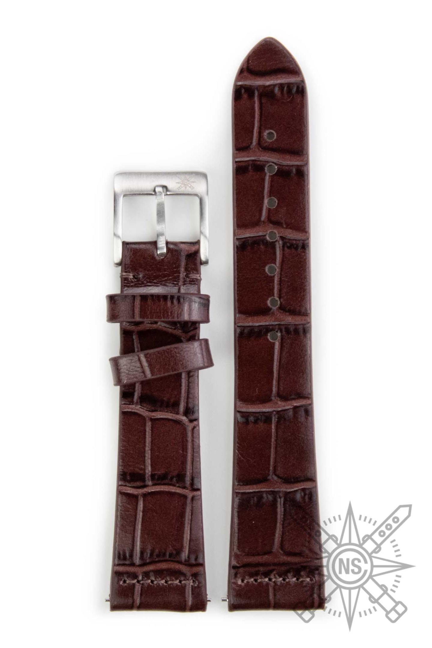 A skilled craftsman is meticulously hand-stitching a brown alligator leather watch strap using traditional tools, showcasing the sophistication and craftsmanship involved in creating unique alligator straps. The scene emphasizes the artisan’s dedication to quality in the leather watch industry.