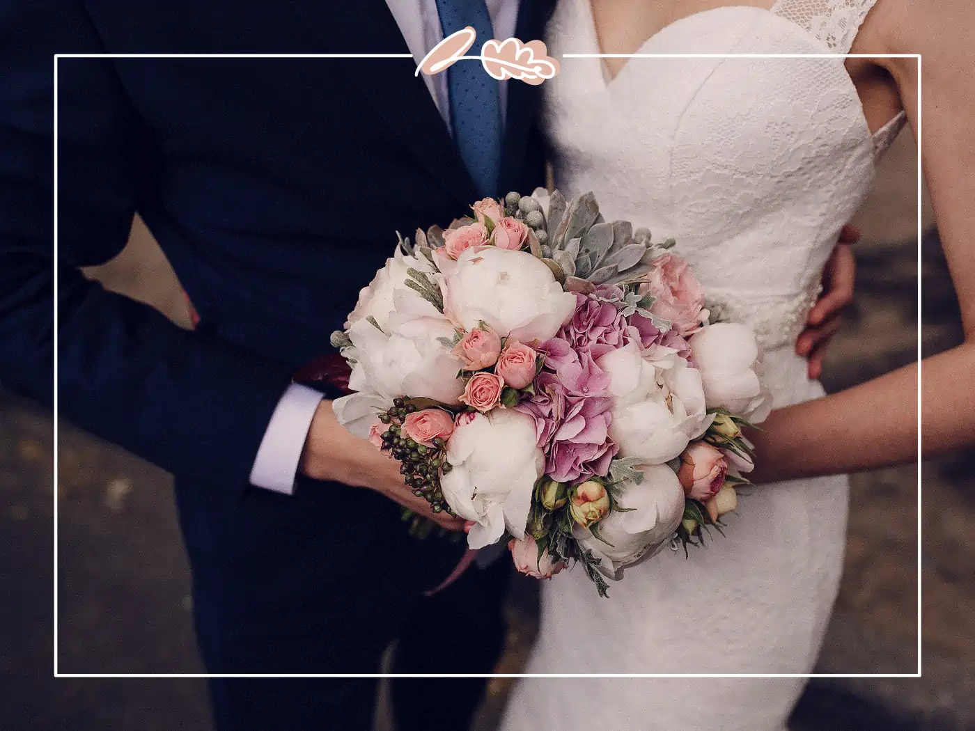 Bride and groom holding a bouquet of white and pink flowers - Fabulous Flowers and gifts