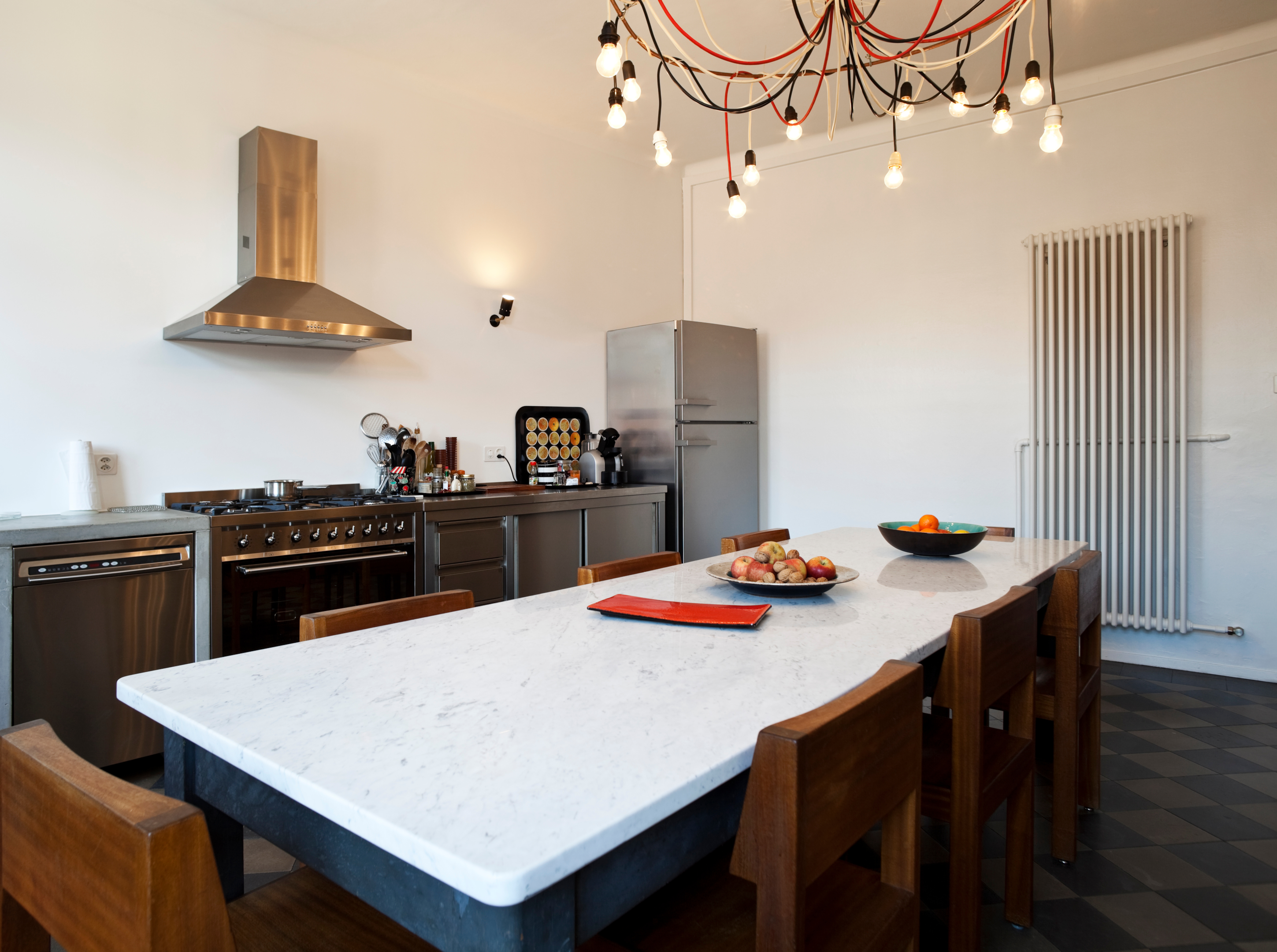 tall kitchen radiators that perfectly complement a new kitchen