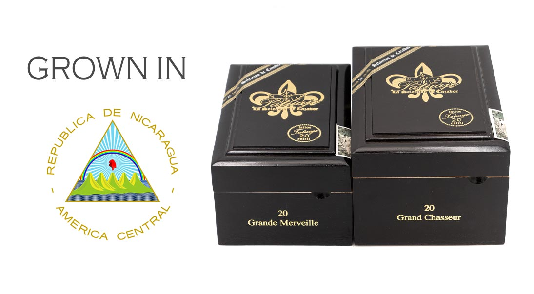 A box of Tatuaje 20th Grande Merveille and Grand Chasseur cigars with the country of origin label