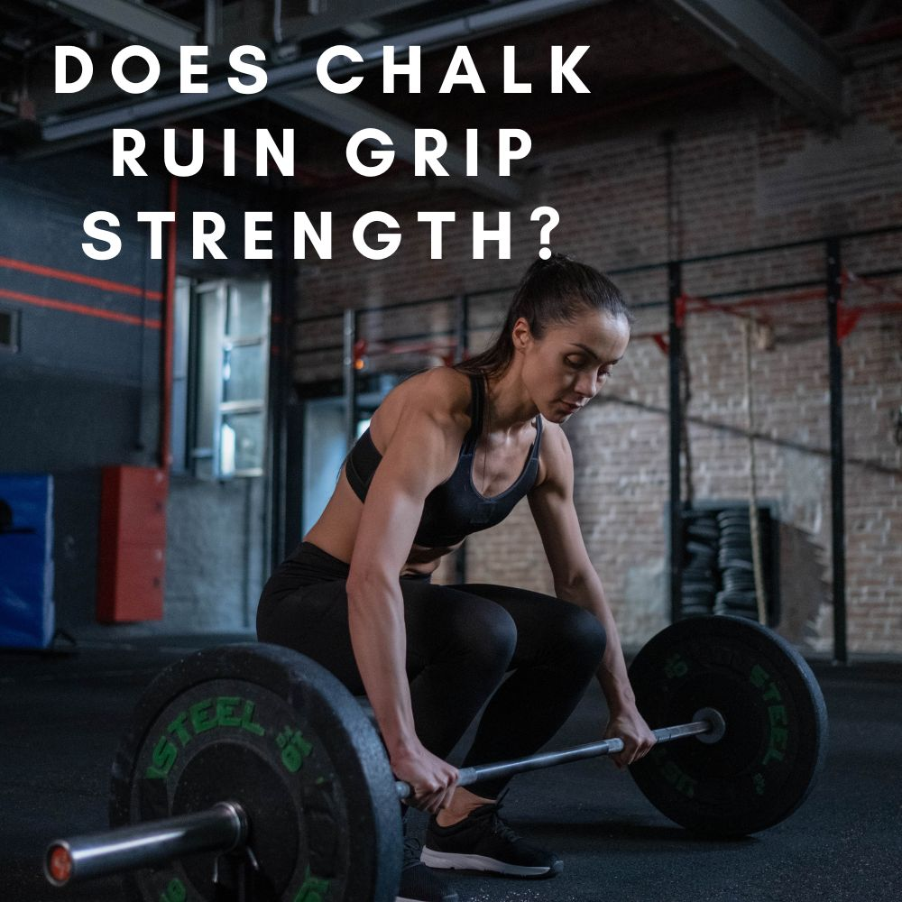 An image showing a person's hand holding a chalk-covered barbell, highlighting the potential drawback of chalk use on grip strength. The keyword does chalk ruin grip strength is emphasized in the description.
