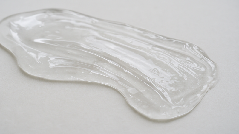 Wet silicone is non-conductive, but can be conductive if surface has contaminants