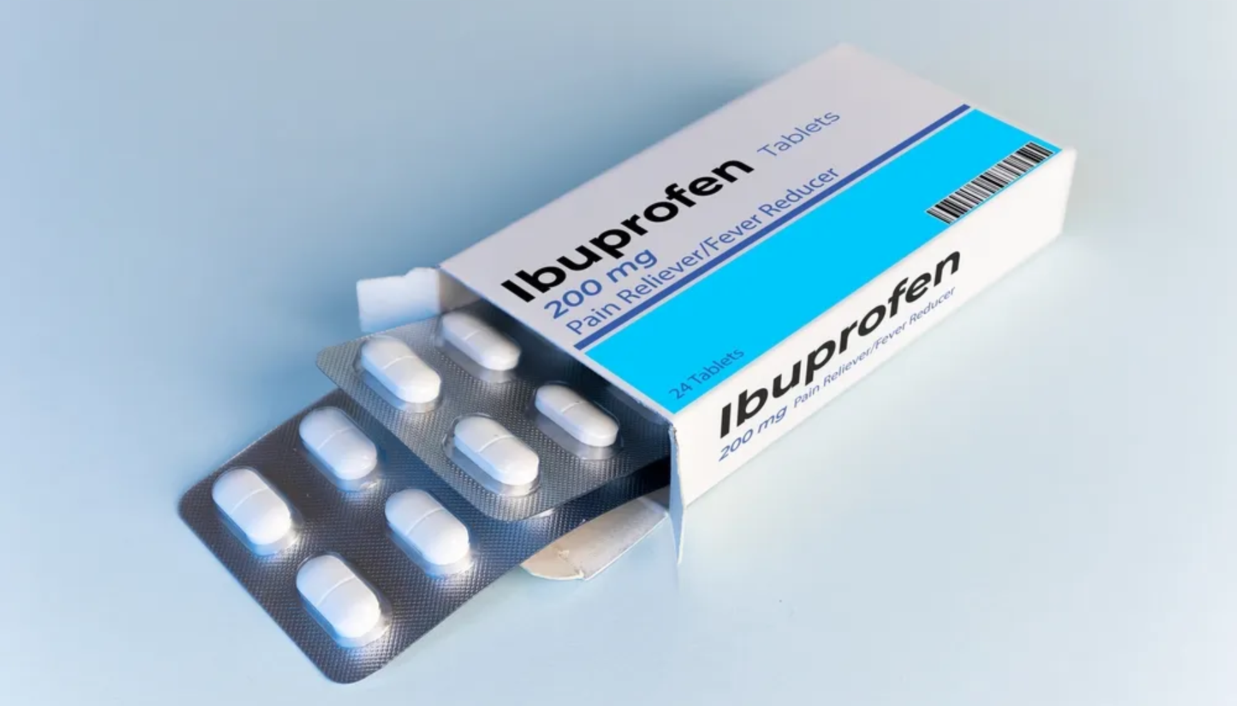 Ibuprofen 200 mg tabletter i blisterpakning og eske, brukt som smertestillende og febernedsettende medisin.