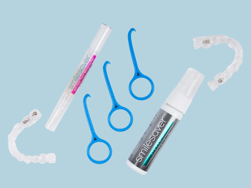 Image of various invisalign accessories for following Invisalign care guidelines.