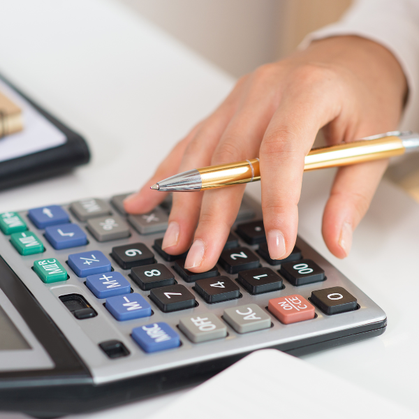 A photograph showing a personal injury attorney calculating lost wages.