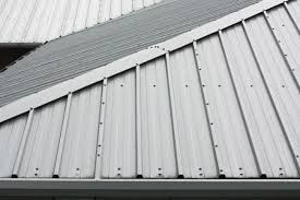 A close-up picture of a standing seam with environmental exposure.