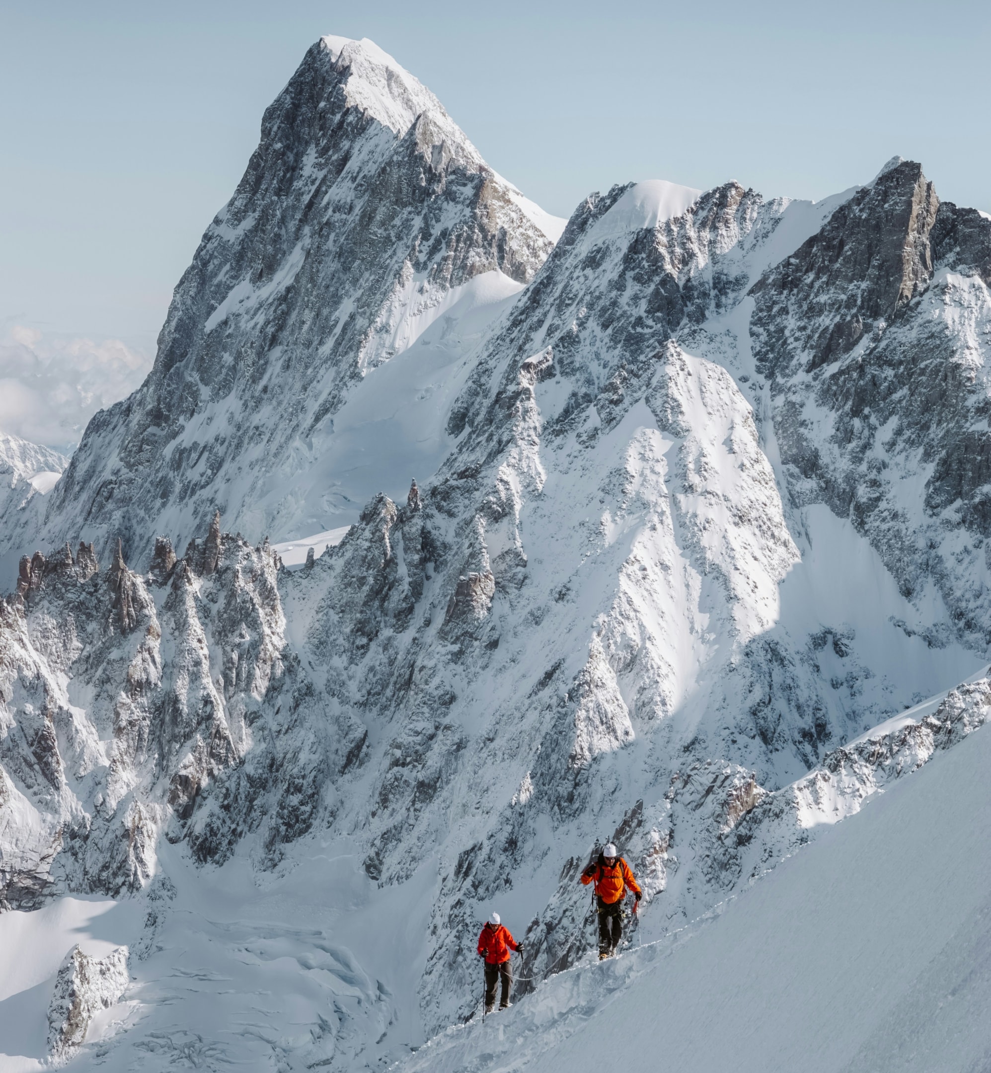 An image of climbers on a mountain, representing the climax.