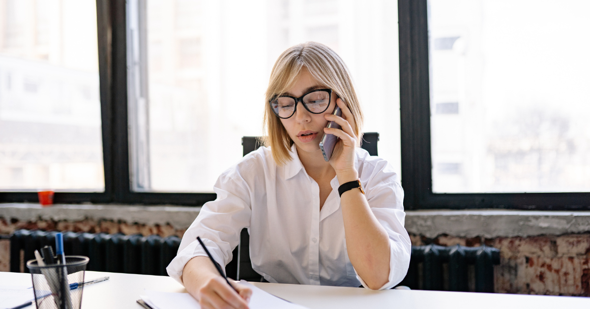 A woman managing her OnlyFans taxes with careful record-keeping.