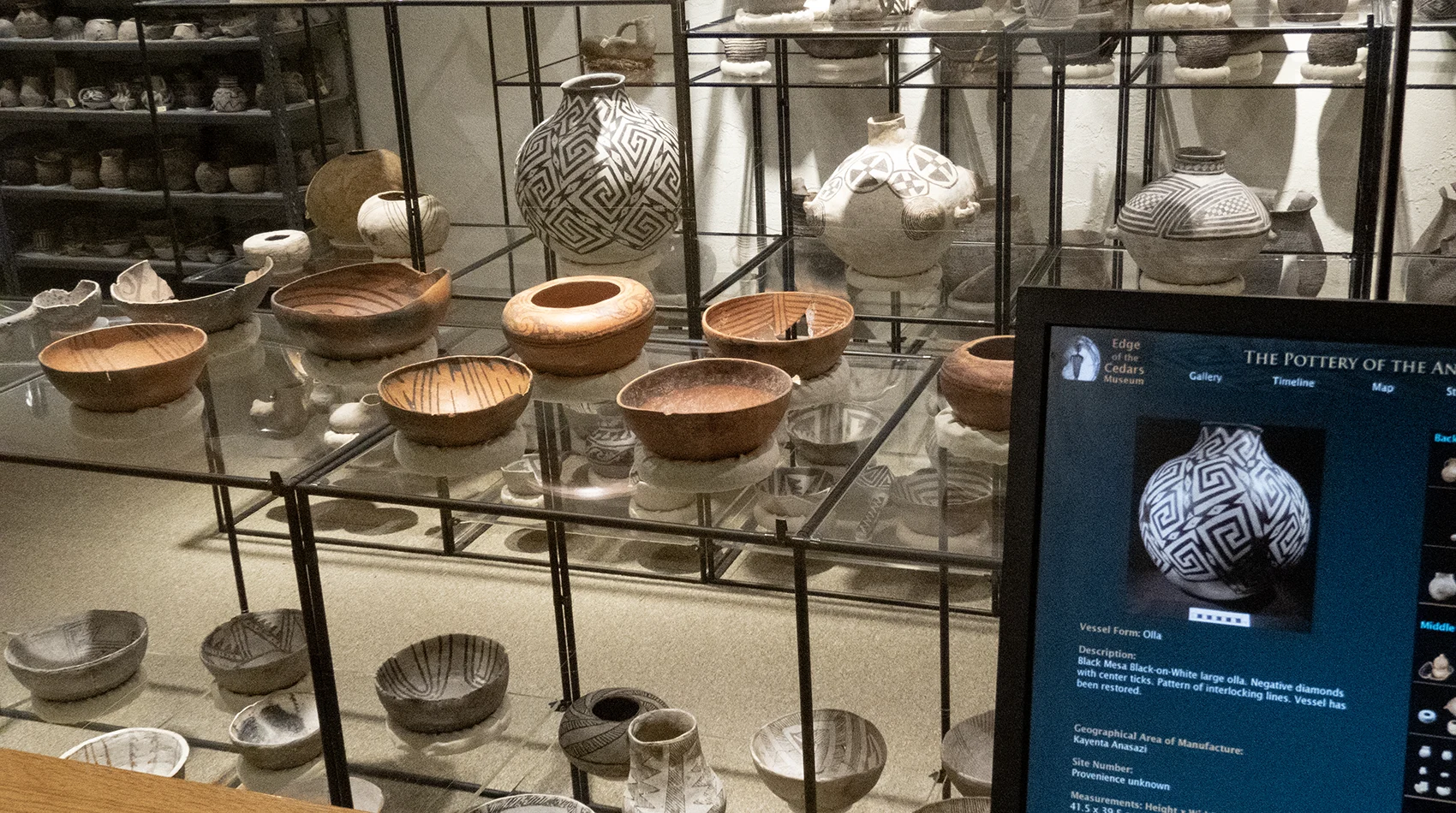 The Visible Storage Room at Edge of the Cedars State Park Museum gives visitors a glimpse into Ancestral Puebloan pottery on display and allows them to explore more deeply on the computer terminal.