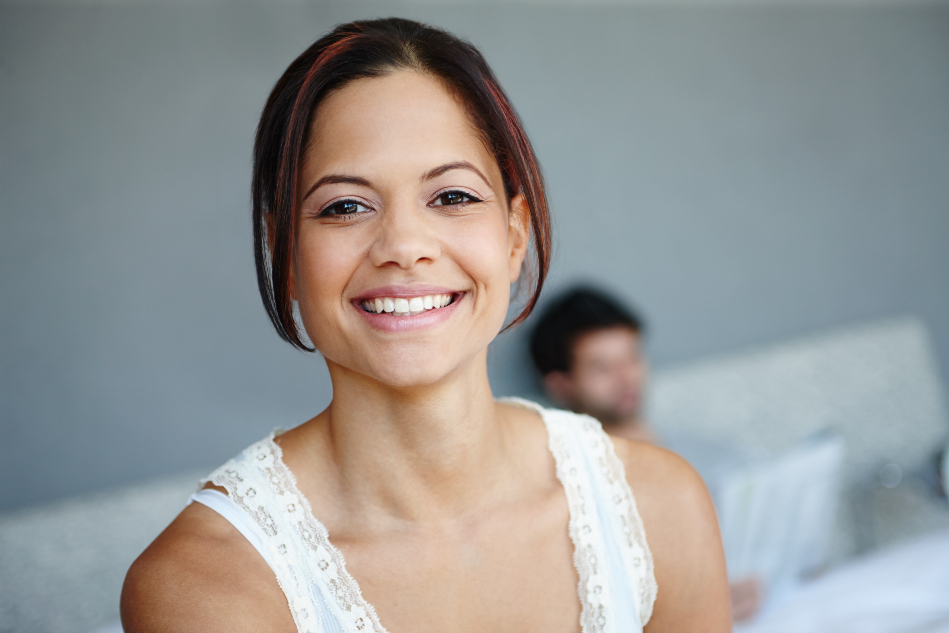 young woman who is educated on dental bone grafts as well as dental implant surgery