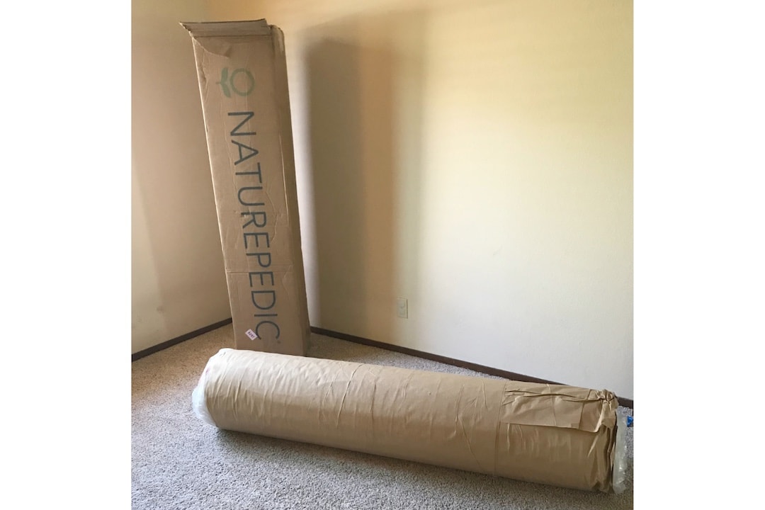 pressure-wrapped and rolled into a large box mattress