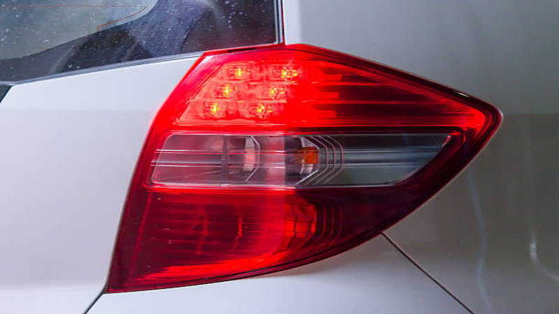 Hazard lights of a car alerting other drivers. 