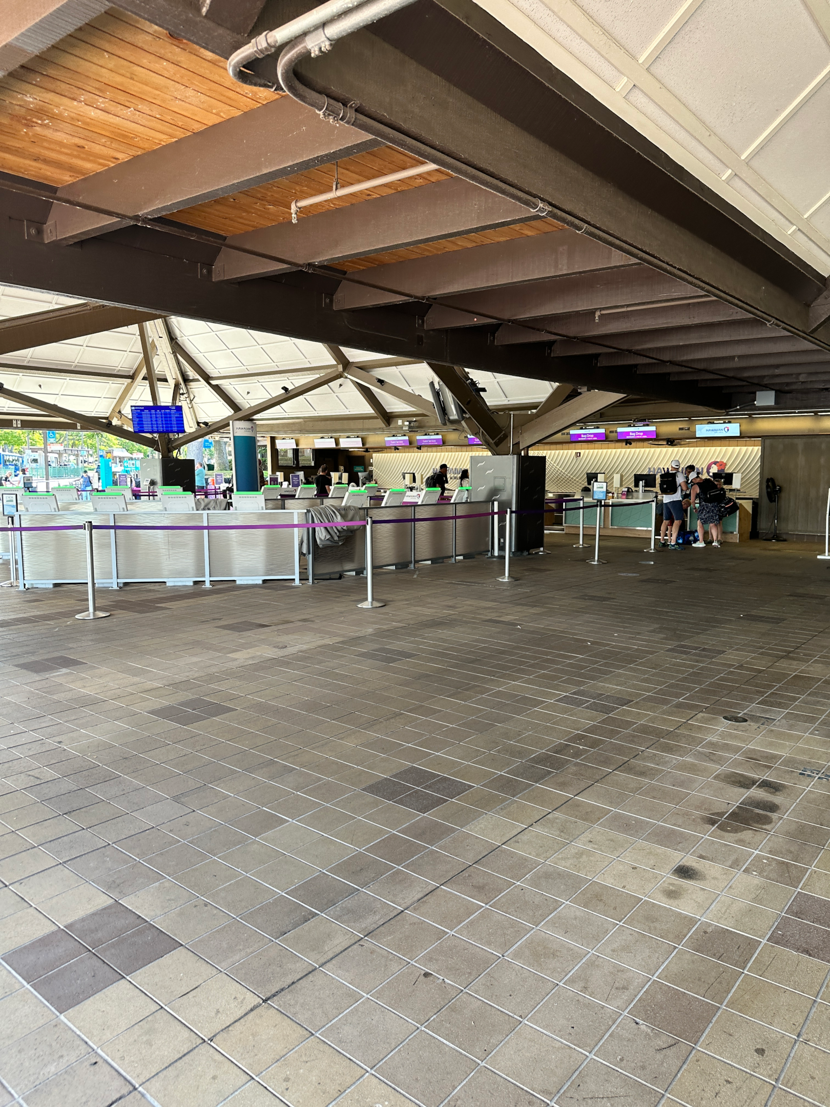 People boarding a plane at Kona International Airport