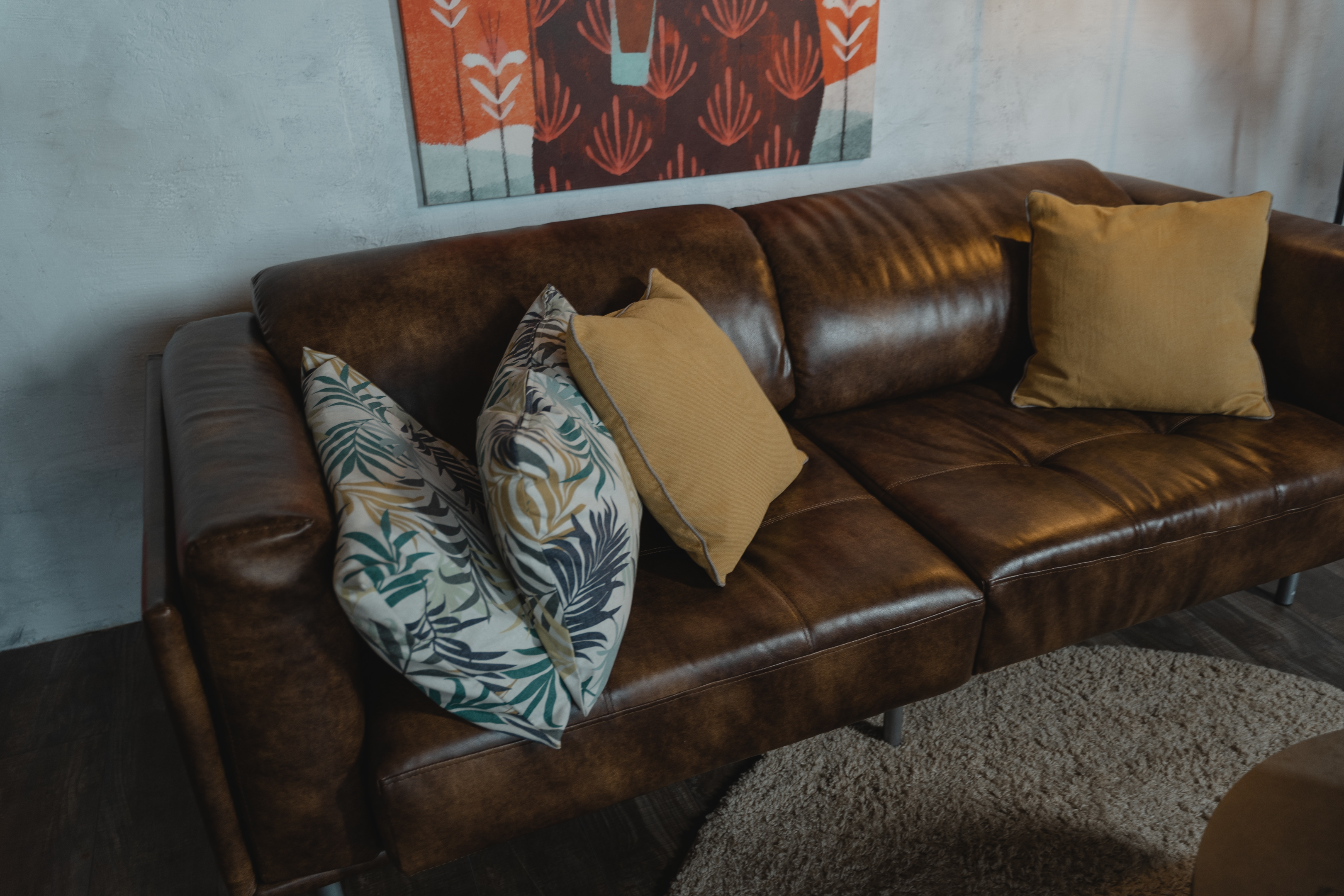 The Benefits of Using Throw Pillows on Your Leather Couch - Shohaus