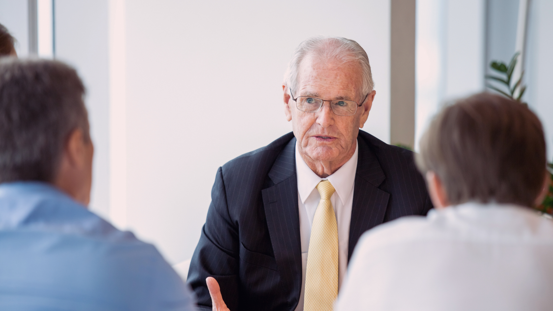 Old timer speaking in an AA home group meeting, sharing personal experience