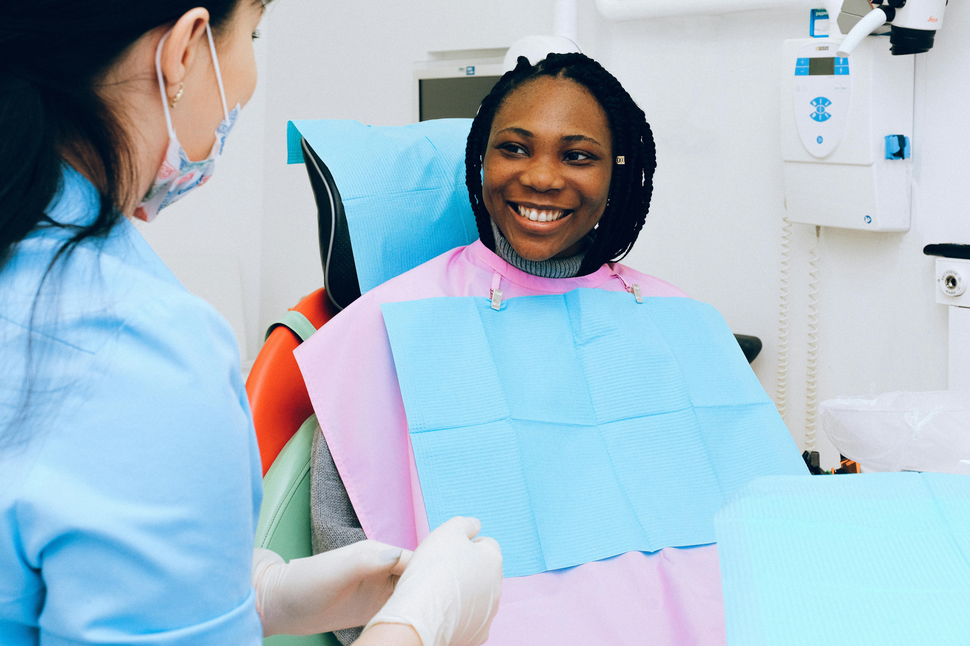 woman happy from tooth pain relief and throbbing tooth pain