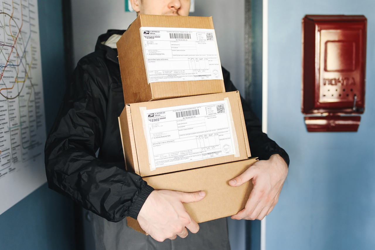 Packages being delivered. When accurate information is housed in a centralized hub, orders are fulfilled more consistently and efficiently.