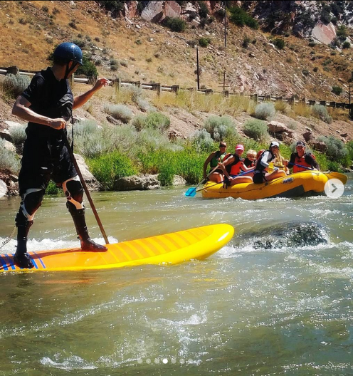 stand up paddle board on the river