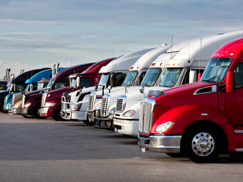 Image showing multiple semi trucks parked in Gwinnett County.