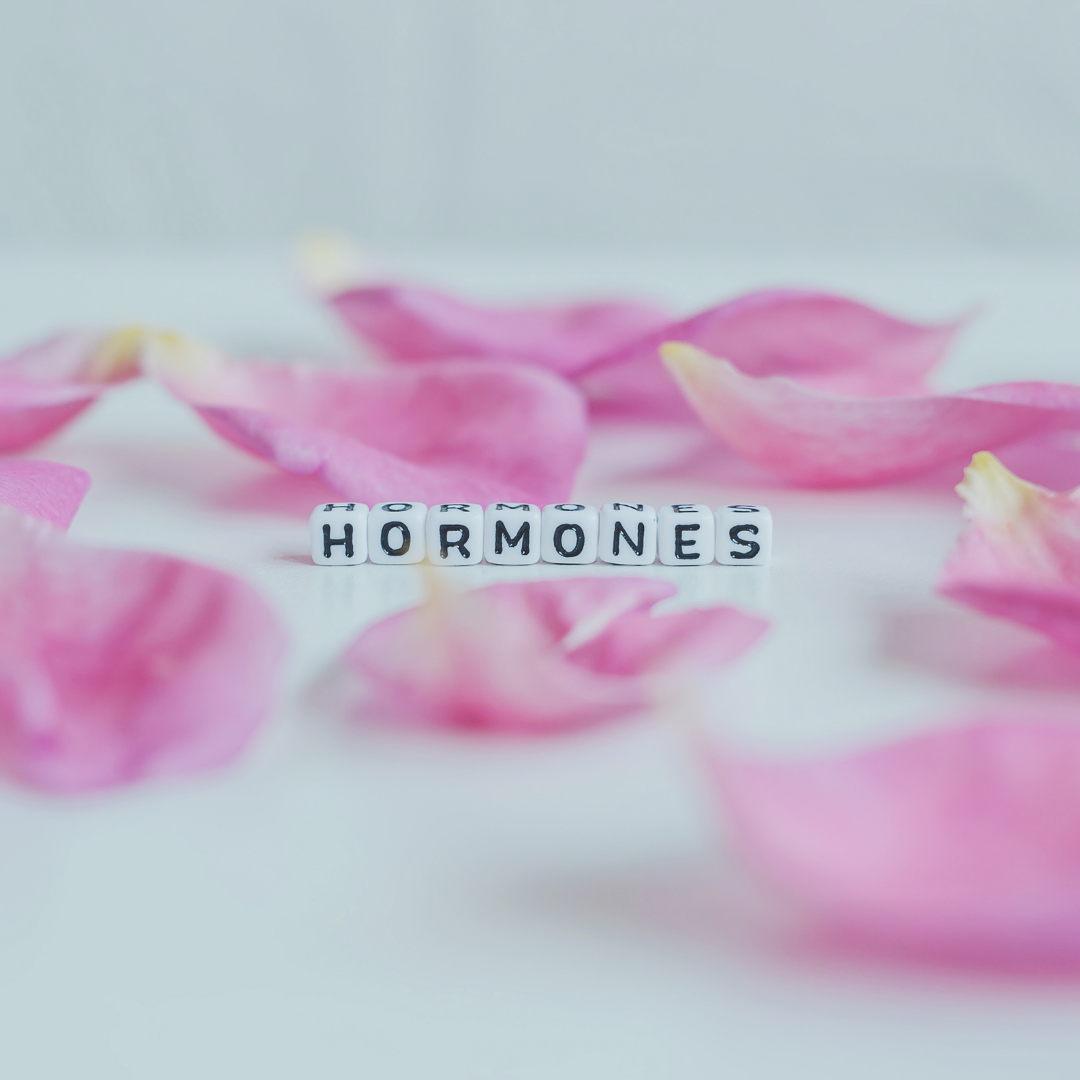 pink petals representing hormone change - how hormone change impact bra size